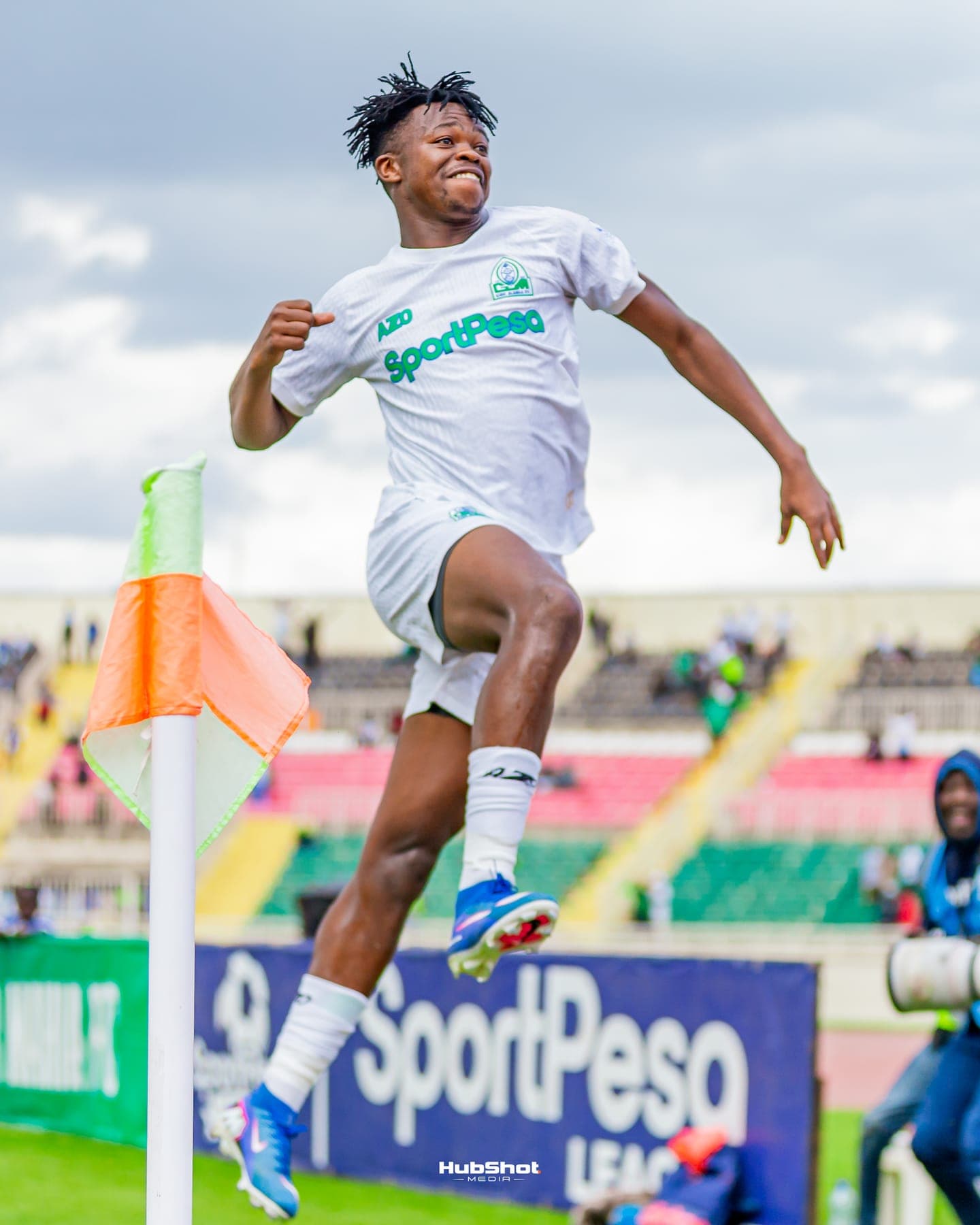 Player leaping in celebration at the corner flag, shot by HubShot