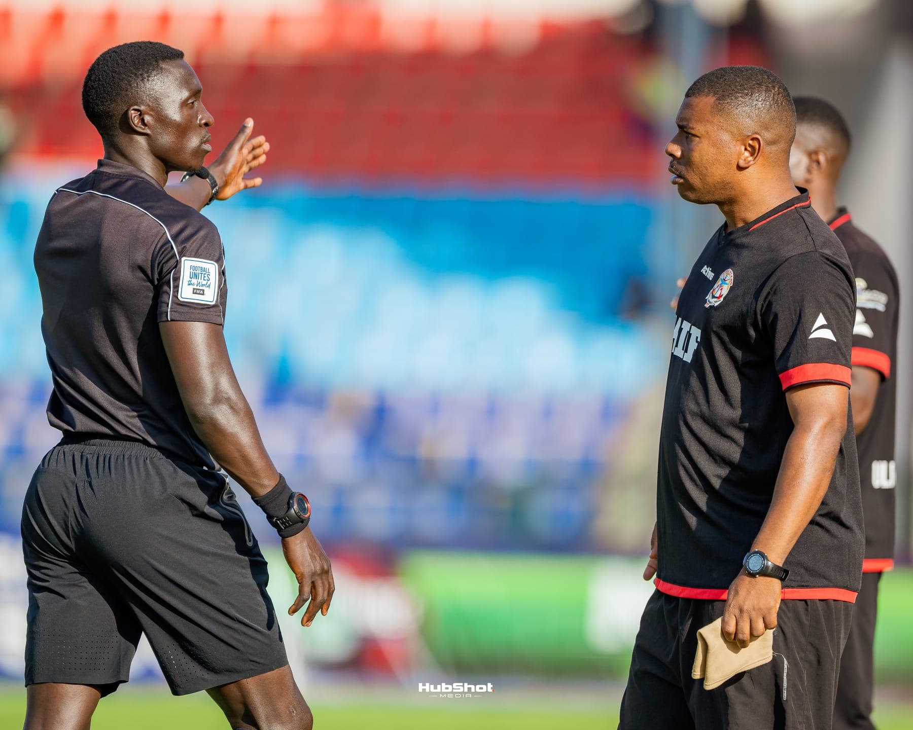 Coach shouting instructions from the touchline